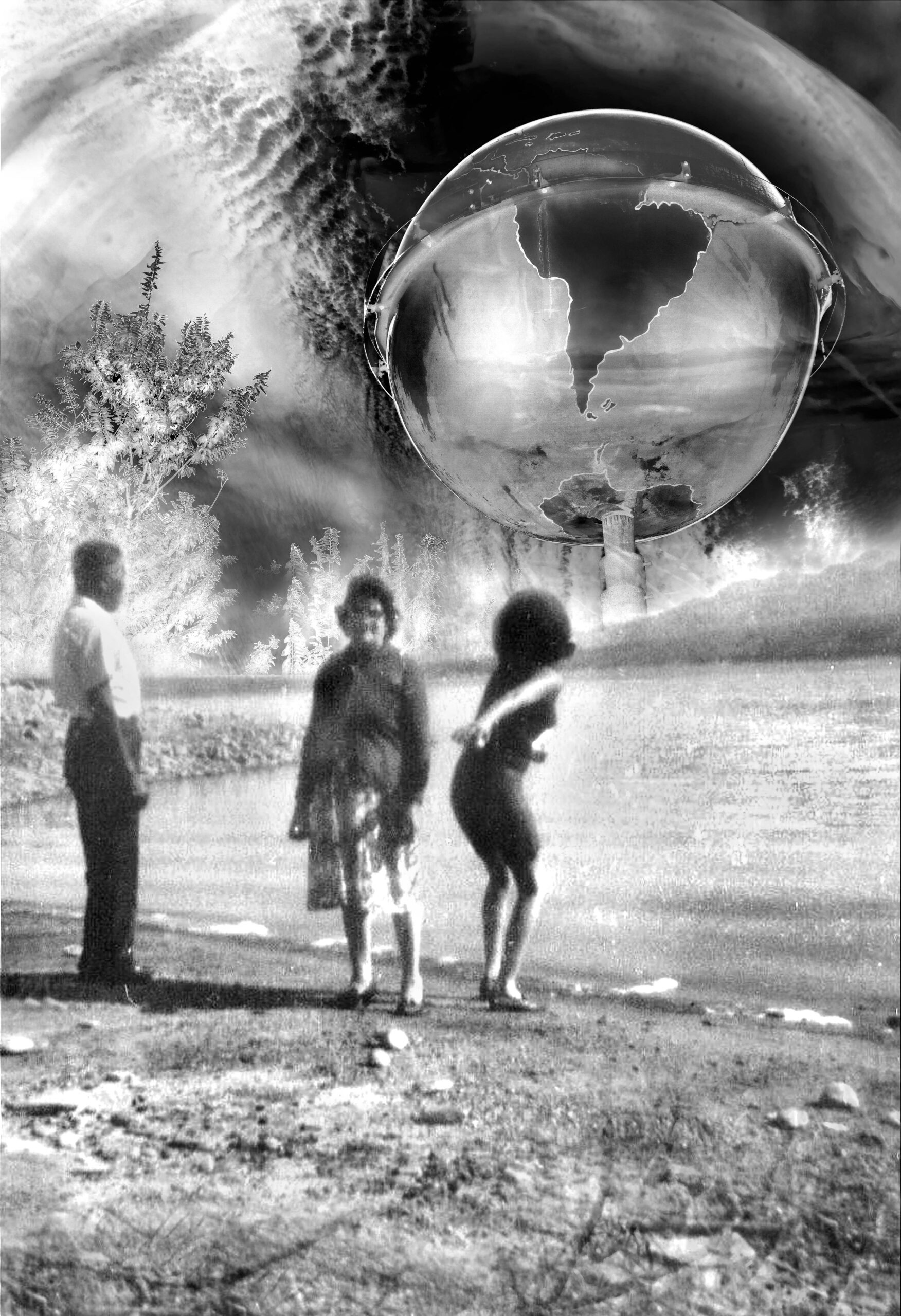 Three people stand outdoors in a surreal landscape beneath a cloudy sky. Above them, a large transparent sphere with a map of Africa and South America floats—an intriguing black and white image by Christina Renee Rodriguez.