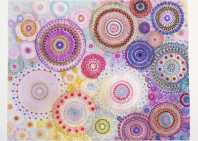 A colorful abstract artwork featuring overlapping circular patterns and dots in vibrant shades of pink, purple, blue, orange, and green on a light background. A lively celebration of color for 2025.