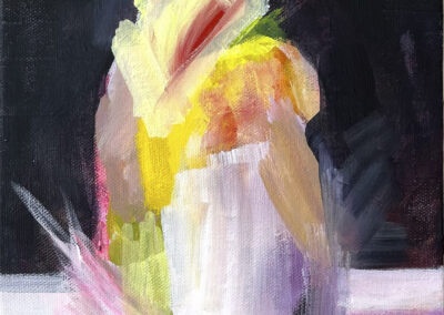 An abstract painting of a penguin features bold, colorful brushstrokes in shades of yellow, pink, white, and black on a dark background with a light surface beneath.