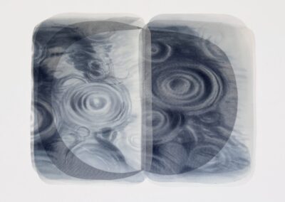 Abstract artwork featuring overlapping, transparent oval shapes in grayscale. Within the ovals, ripple patterns resembling water circles or concentric waves create a layered, fluid effect against a white background.