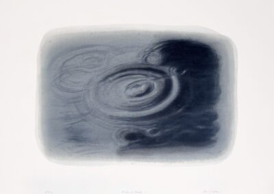 A watercolor painting showing concentric ripples spreading across a dark, reflective water surface, with soft gradients of gray and blue blending into each other. The image has an abstract, serene quality.