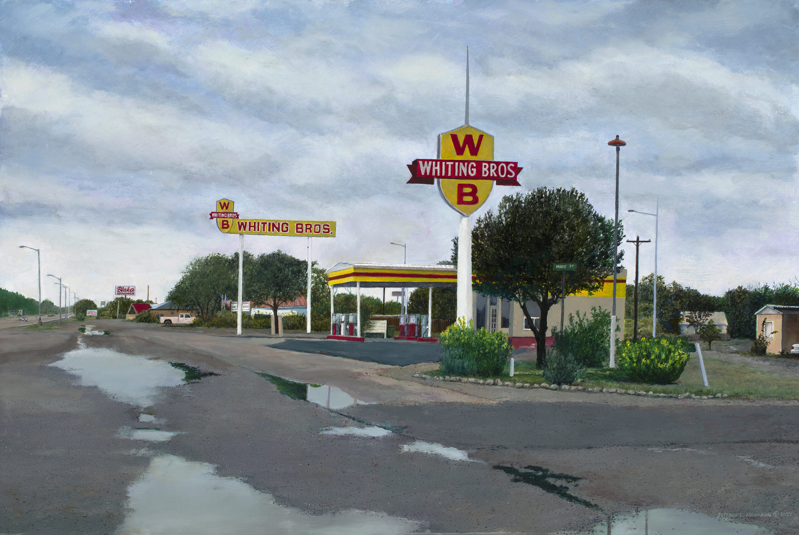 A Jeffrey Neumann painting of a Whiting Bros. gas station with tall, yellow-and-red branded signs, set along a Route 66 road with puddles under a cloudy sky.